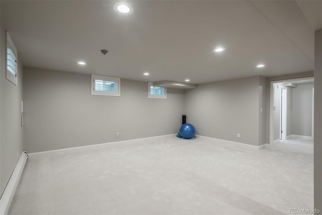 5164 E Princeton Ave, Cherry Hills Village, CO 80113 - below grade area featuring recessed lighting, baseboards, light colored carpet, and a baseboard heating unit