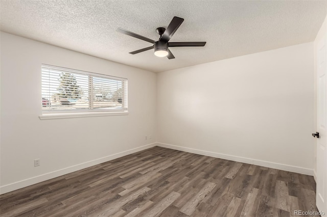 unfurnished room with a textured ceiling, dark hardwood / wood-style floors, and ceiling fan