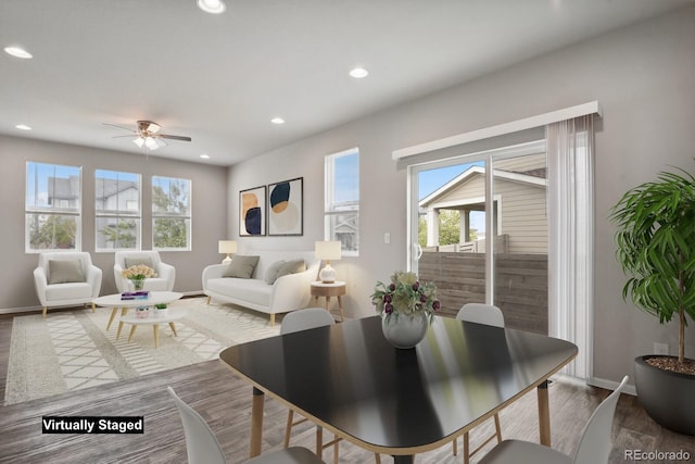 living room featuring recessed lighting, baseboards, ceiling fan, and wood finished floors