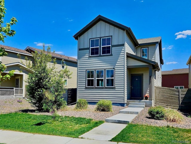 4770 N Jasper St, Denver, CO 80239 - traditional-style home featuring board and batten siding and fence