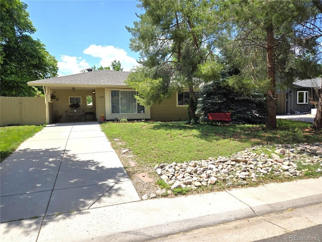 1245 S Forest St, Denver, CO 80246 - view of front of home featuring driveway, roof with shingles, and an attached carport