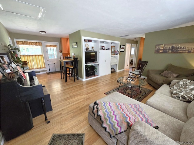 1245 S Forest St, Denver, CO 80246 - living area with light wood finished floors and attic access