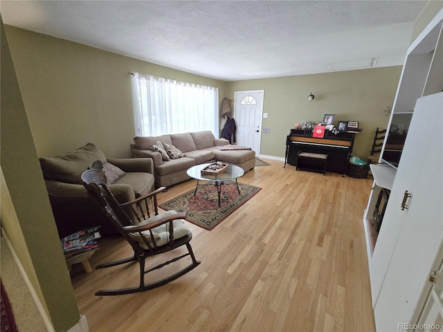1245 S Forest St, Denver, CO 80246 - living room with light wood-style floors