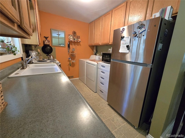 1245 S Forest St, Denver, CO 80246 - kitchen featuring freestanding refrigerator and washing machine and clothes dryer