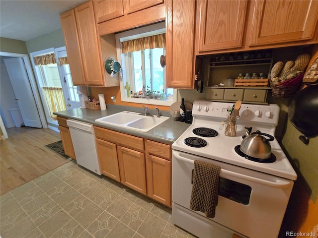 1245 S Forest St, Denver, CO 80246 - kitchen featuring white appliances and a sink