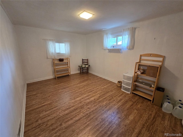 1245 S Forest St, Denver, CO 80246 - below grade area featuring wood finished floors and healthy amount of natural light