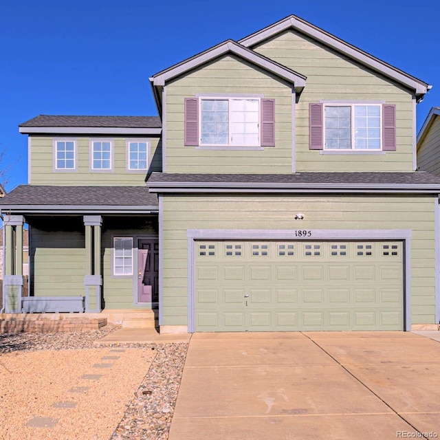 view of front of house featuring a garage and driveway