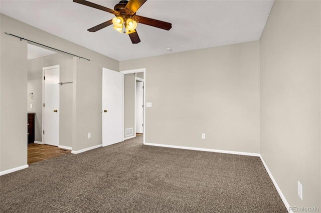 1895 Sage Grouse Ln, Colorado Springs, CO 80951 - unfurnished bedroom with carpet flooring, baseboards, and a ceiling fan