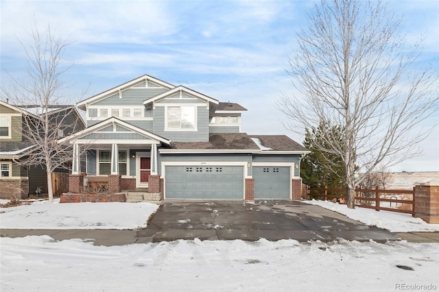 craftsman-style home with a garage