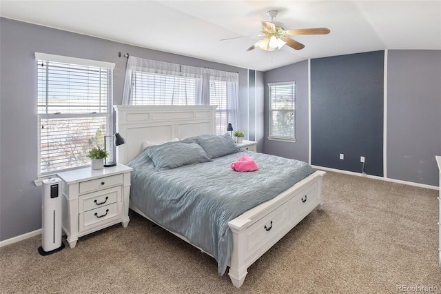 bedroom with baseboards, light carpet, and a ceiling fan