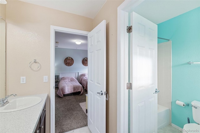 full bath featuring vanity, shower / bath combination, toilet, and connected bathroom