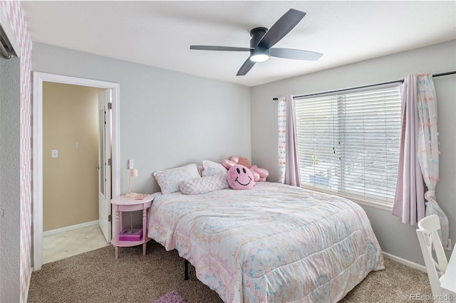 bedroom featuring baseboards, carpet, and ceiling fan