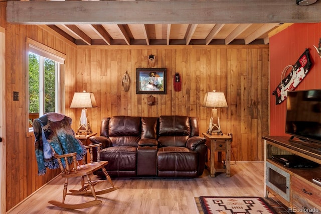 546 Pulver Rd, Lake George, CO 80827 - living room featuring beam ceiling, wooden walls, and light wood finished floors