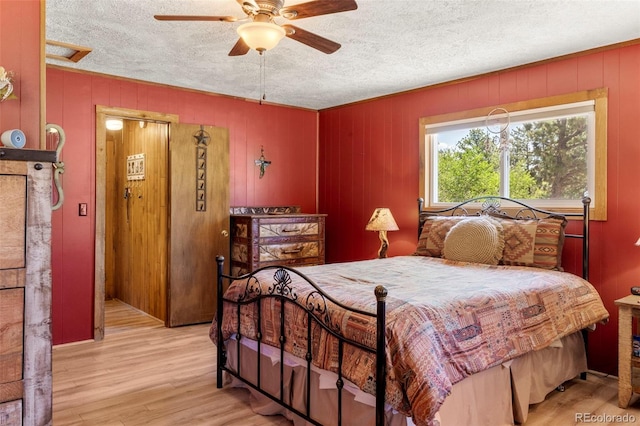 546 Pulver Rd, Lake George, CO 80827 - bedroom with wood finished floors, a textured ceiling, and ceiling fan