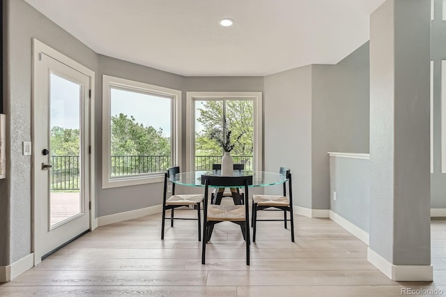 7400 S Genoa Cir, Centennial, CO 80016 - dining space with light wood-style flooring and recessed lighting