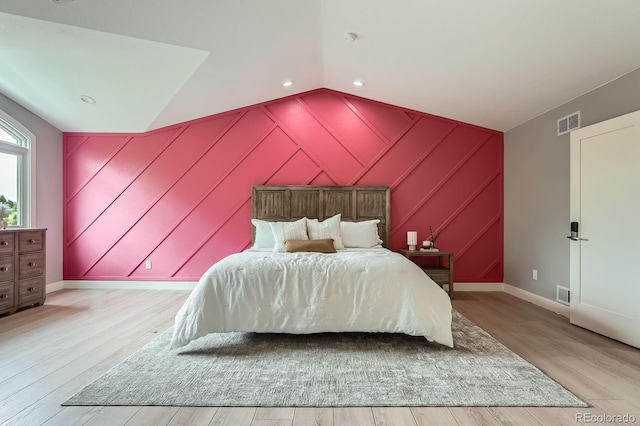 7400 S Genoa Cir, Centennial, CO 80016 - bedroom featuring wood finished floors, lofted ceiling, and recessed lighting