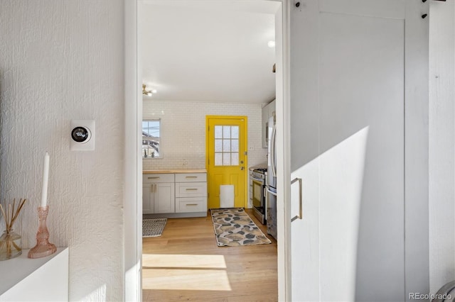 bathroom with hardwood / wood-style flooring