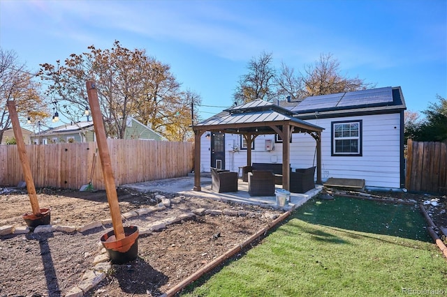 view of yard featuring an outdoor living space, a gazebo, and a patio area