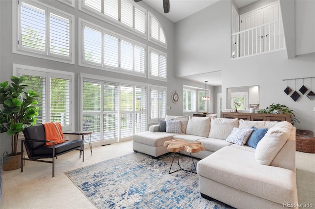 920 Shady Oak Ln, Castle Pines, CO 80108 - carpeted living room with a towering ceiling and a ceiling fan