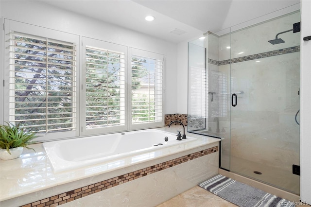 920 Shady Oak Ln, Castle Pines, CO 80108 - bathroom with a shower stall, a garden tub, recessed lighting, and tile patterned flooring