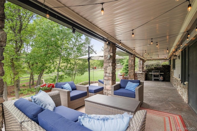 920 Shady Oak Ln, Castle Pines, CO 80108 - view of patio / terrace featuring an outdoor living space