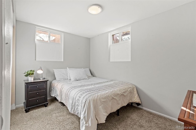 bedroom with light colored carpet