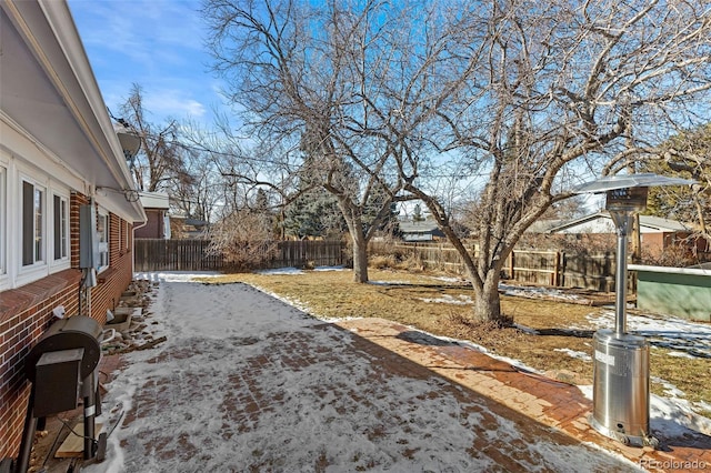 view of yard covered in snow