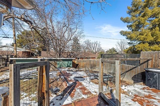 view of snow covered deck