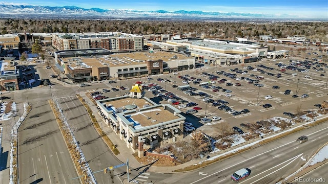 birds eye view of property featuring a mountain view