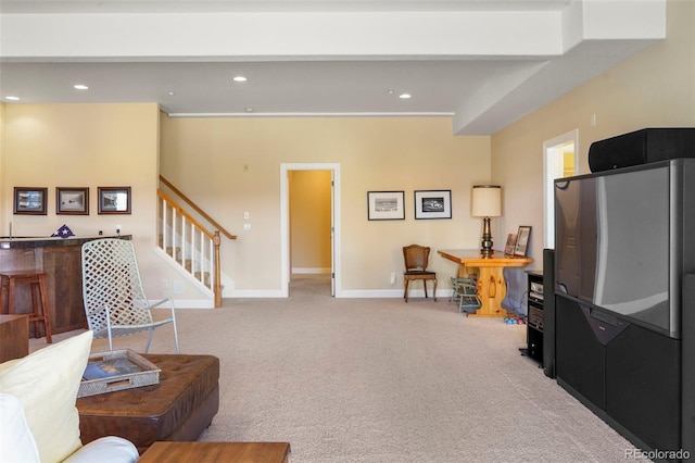 living area featuring stairway, recessed lighting, carpet flooring, and baseboards