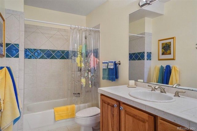 bathroom featuring shower / bath combo, tile patterned flooring, vanity, and toilet