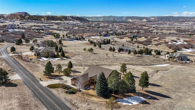 drone / aerial view featuring a mountain view