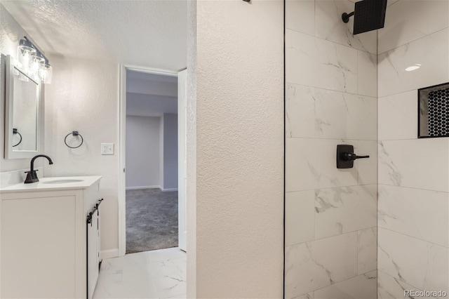 bathroom with vanity and tile patterned flooring