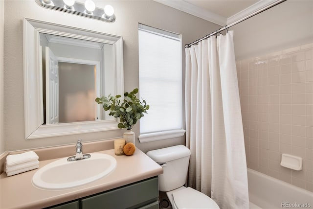 full bathroom with vanity, crown molding, shower / bath combo with shower curtain, and toilet