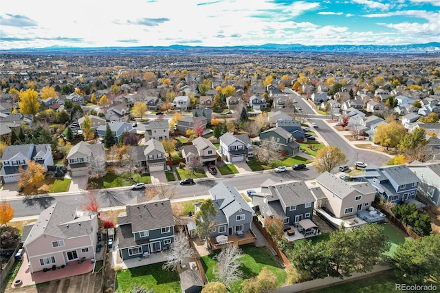 drone / aerial view with a mountain view and a residential view