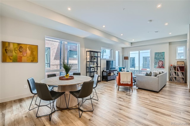 dining room featuring light hardwood / wood-style floors