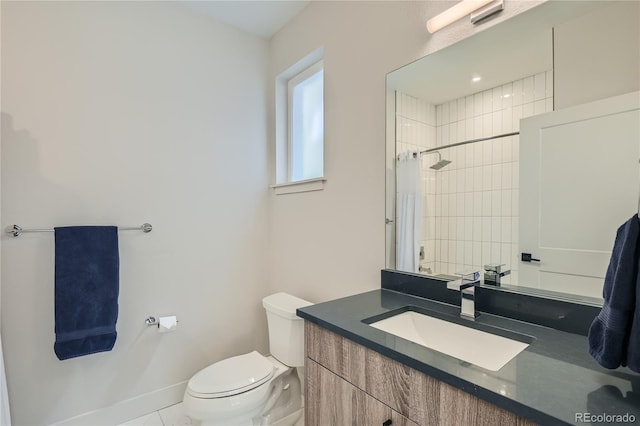 bathroom featuring toilet, a shower with curtain, vanity, and tile patterned floors