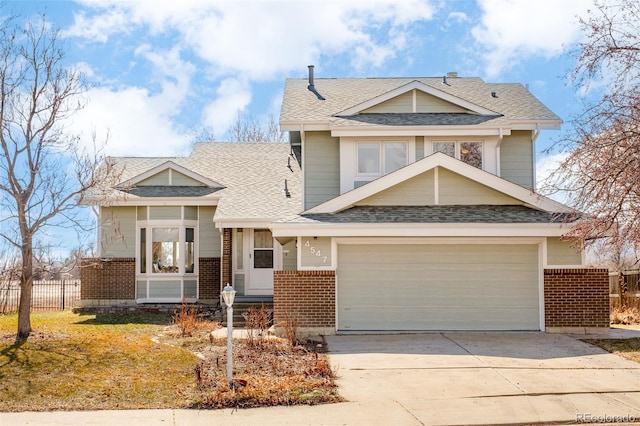 view of front of property featuring driveway, brick siding, roof with shingles, and fence