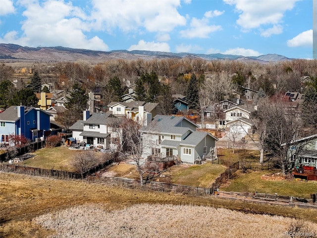 birds eye view of property featuring a residential view and a mountain view