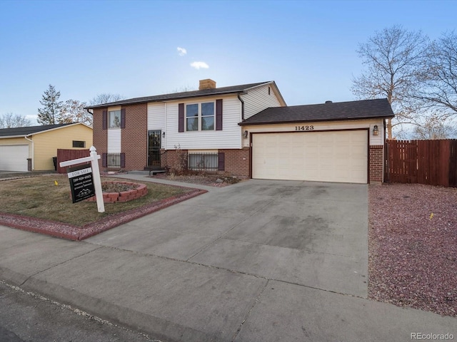 raised ranch with a garage