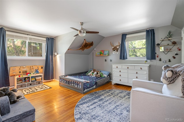 1521 Columbine Blvd, Colorado Springs, CO 80907 - bedroom with vaulted ceiling, wood finished floors, and ceiling fan