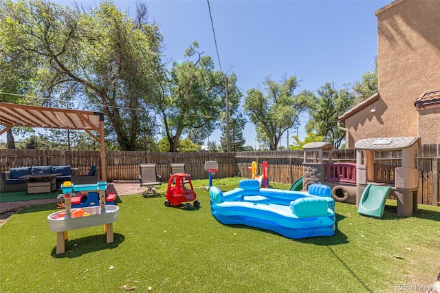 1521 Columbine Blvd, Colorado Springs, CO 80907 - view of play area featuring an outdoor hangout area and a fenced backyard