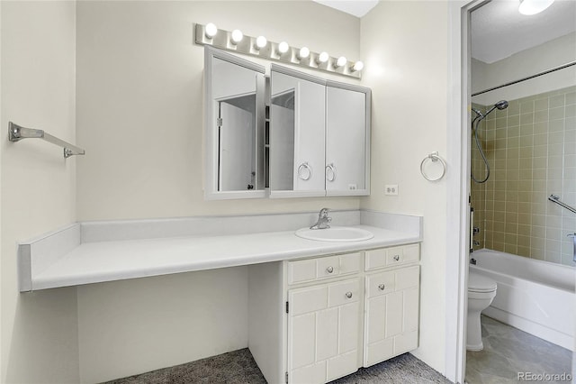 bathroom featuring toilet, tile patterned floors, bathing tub / shower combination, and vanity