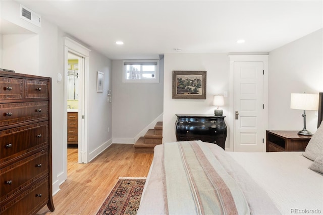 bedroom with visible vents, recessed lighting, baseboards, and light wood-style floors