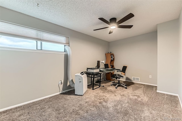 8100 W Quincy Ave Unit 11, Denver, CO 80123 - office featuring a ceiling fan, carpet flooring, baseboards, and a textured ceiling