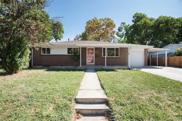 ranch-style house with a garage, a carport, and a front lawn