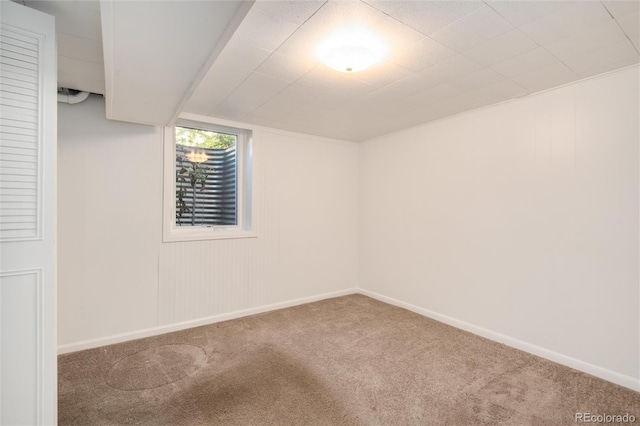 basement featuring carpet flooring