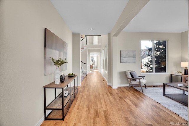 hallway with light wood-type flooring