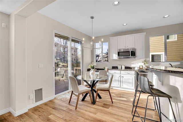 dining area featuring light hardwood / wood-style floors