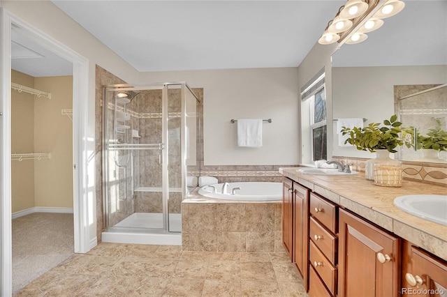 bathroom featuring plus walk in shower and vanity